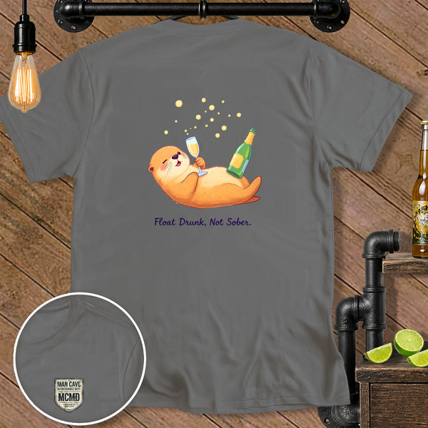 Gray t-shirt with otter holding champagne and saying "Float Drunk, Not Sober."