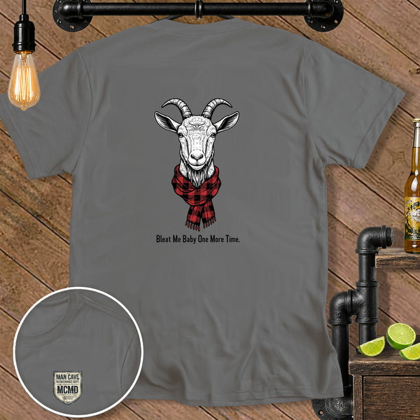T-shirt with a goat illustration wearing a red plaid scarf and the text "Bleat Me Baby One More Time."