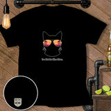 Black t-shirt with outline of cat wearing sunglasses, text 