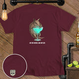 Maroon t-shirt with armadillo holding margarita and text 
