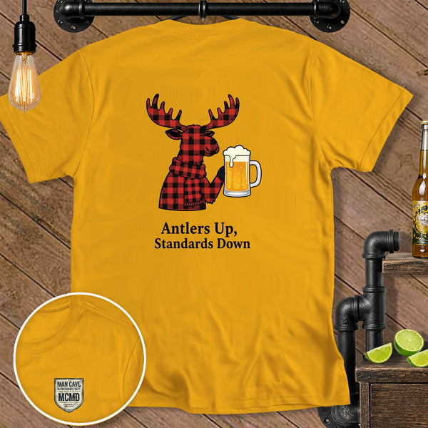 Yellow t-shirt with a moose wearing a plaid scarf holding a beer mug and text.