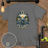 Grey t-shirt with a graphic of a lake scene, oars, and text 