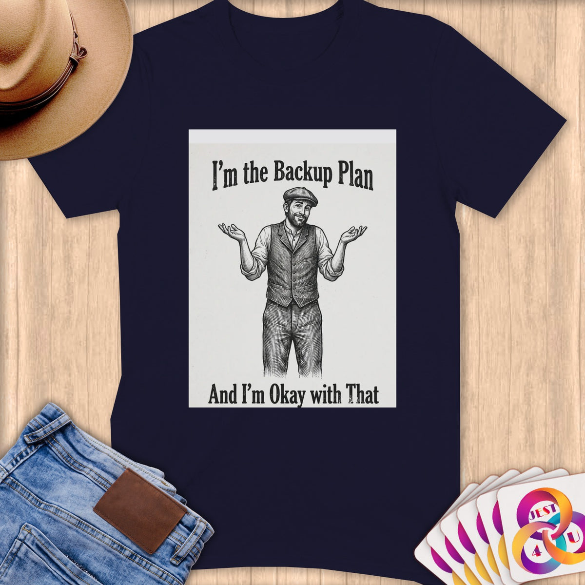 Dark blue t-shirt with "I'm the Backup Plan And I'm Okay with That" text and illustration.