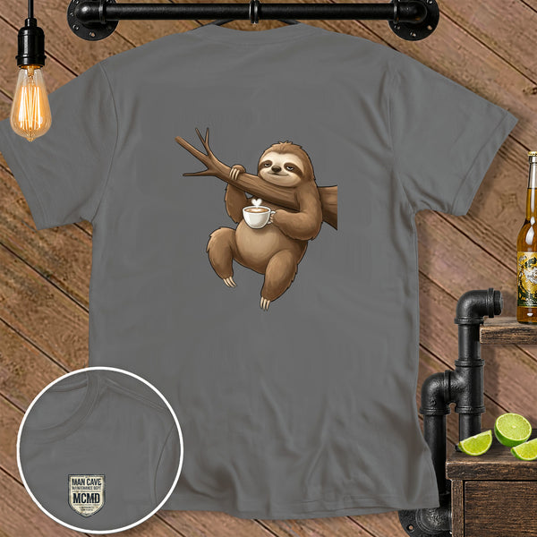 Grey t-shirt with a cartoon sloth hanging from a branch holding a coffee mug.
