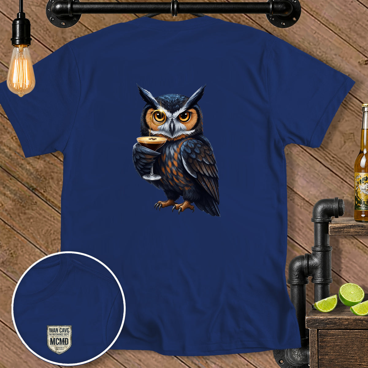 Navy t-shirt with illustrated owl holding a martini glass and a small shield logo.