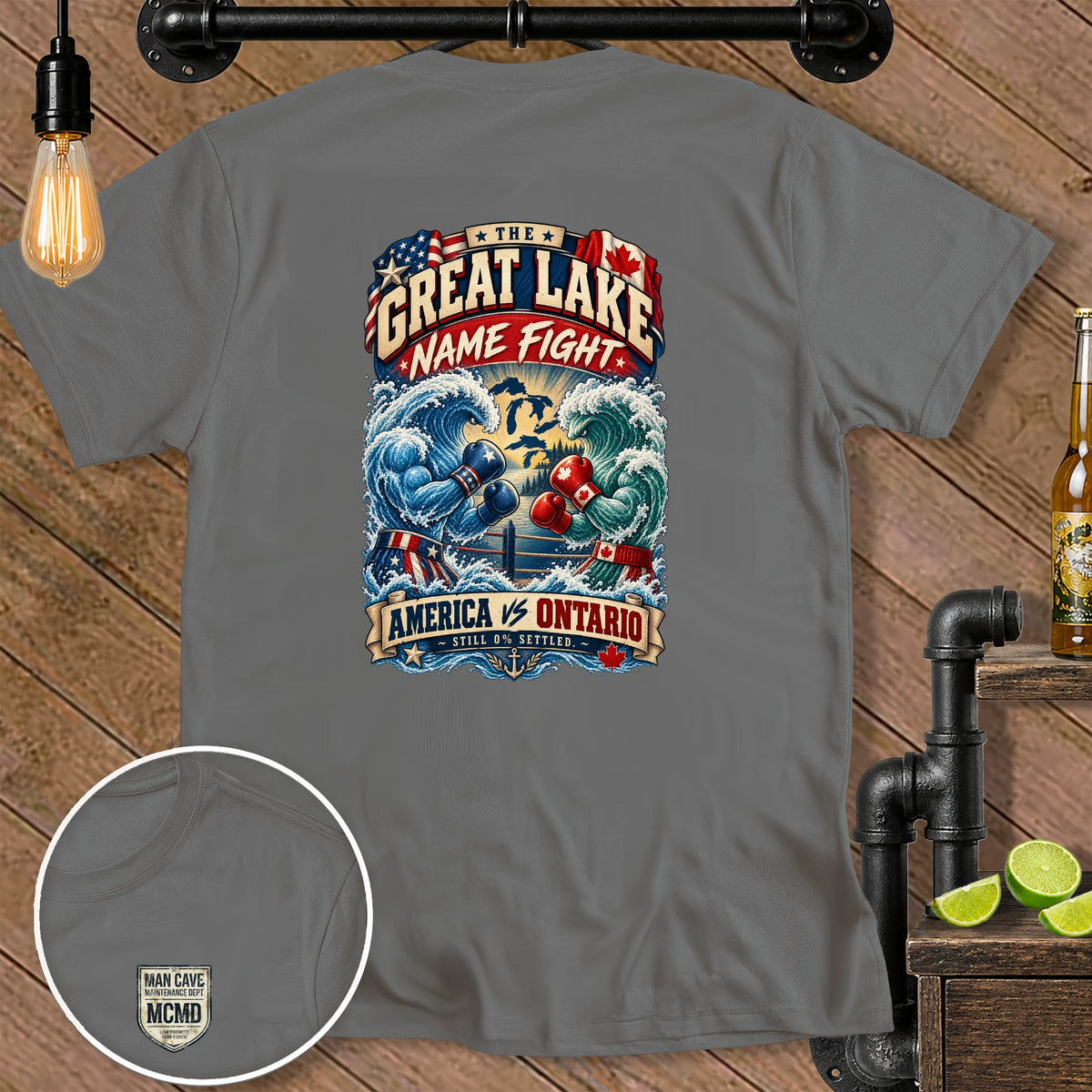 Grey t-shirt with "Great Lake Name Fight America vs Ontario" graphic.