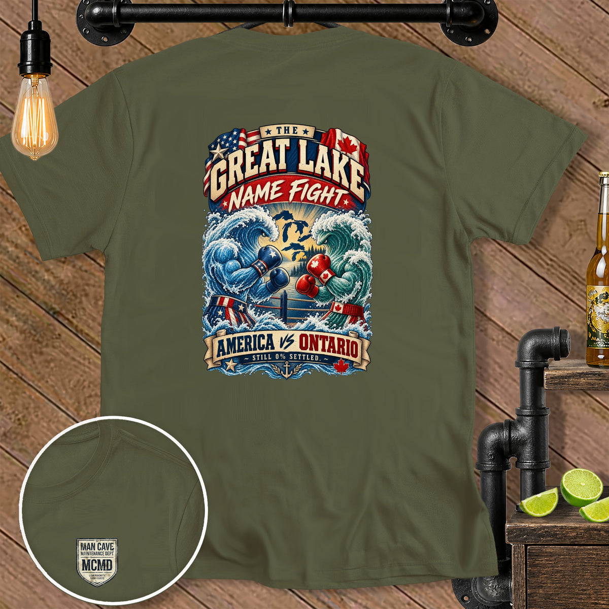 T-shirt graphic: "The Great Lake Name Fight" boxing waves, America vs. Ontario.