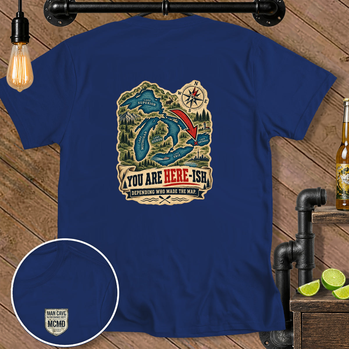 Blue t-shirt with Great Lakes map graphic and text "YOU ARE HERE-ISH".