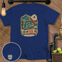 Blue t-shirt with Great Lakes map graphic and text "YOU ARE HERE-ISH".