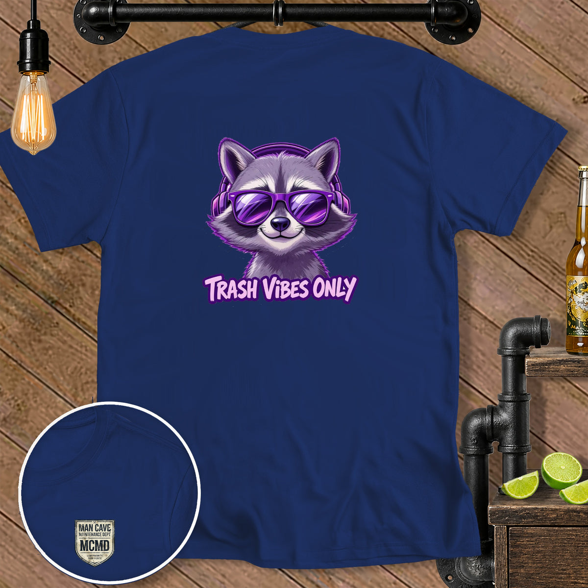 Navy t-shirt with a raccoon wearing headphones and sunglasses, reading "TRASH VIBES ONLY".