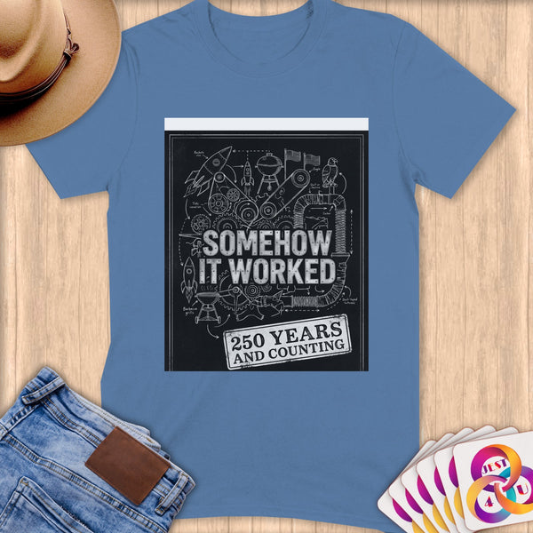 T-shirt with blueprint-style graphic saying "Somehow It Worked 250 Years and Counting."