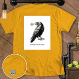 Yellow t-shirt with raven holding a key and 
