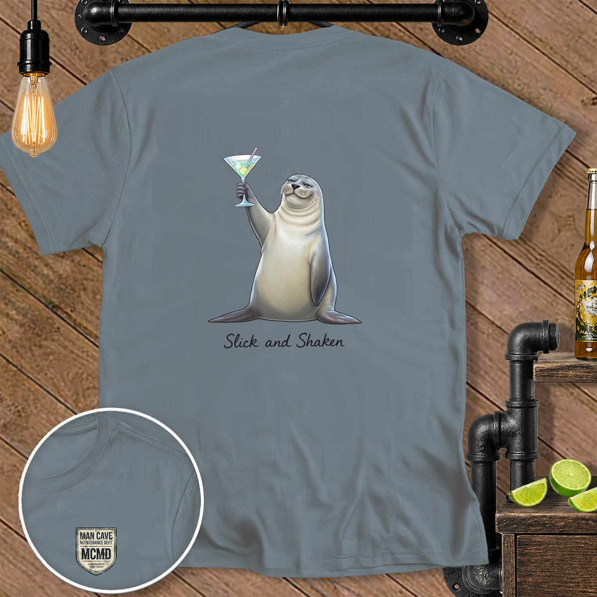 Gray t-shirt with a seal holding a martini and the text "Slick and Shaken."