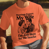 Orange t-shirt with vintage couple illustration and humorous text.