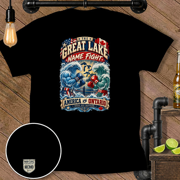 Black t-shirt graphic with "The Great Lake Name Fight" text and boxing waves.