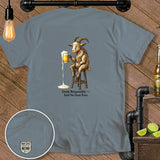 Goat sitting on a stool drinking beer with text 