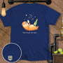 Navy blue t-shirt with illustration of otter holding champagne and text "Float Drunk, Not Sober."