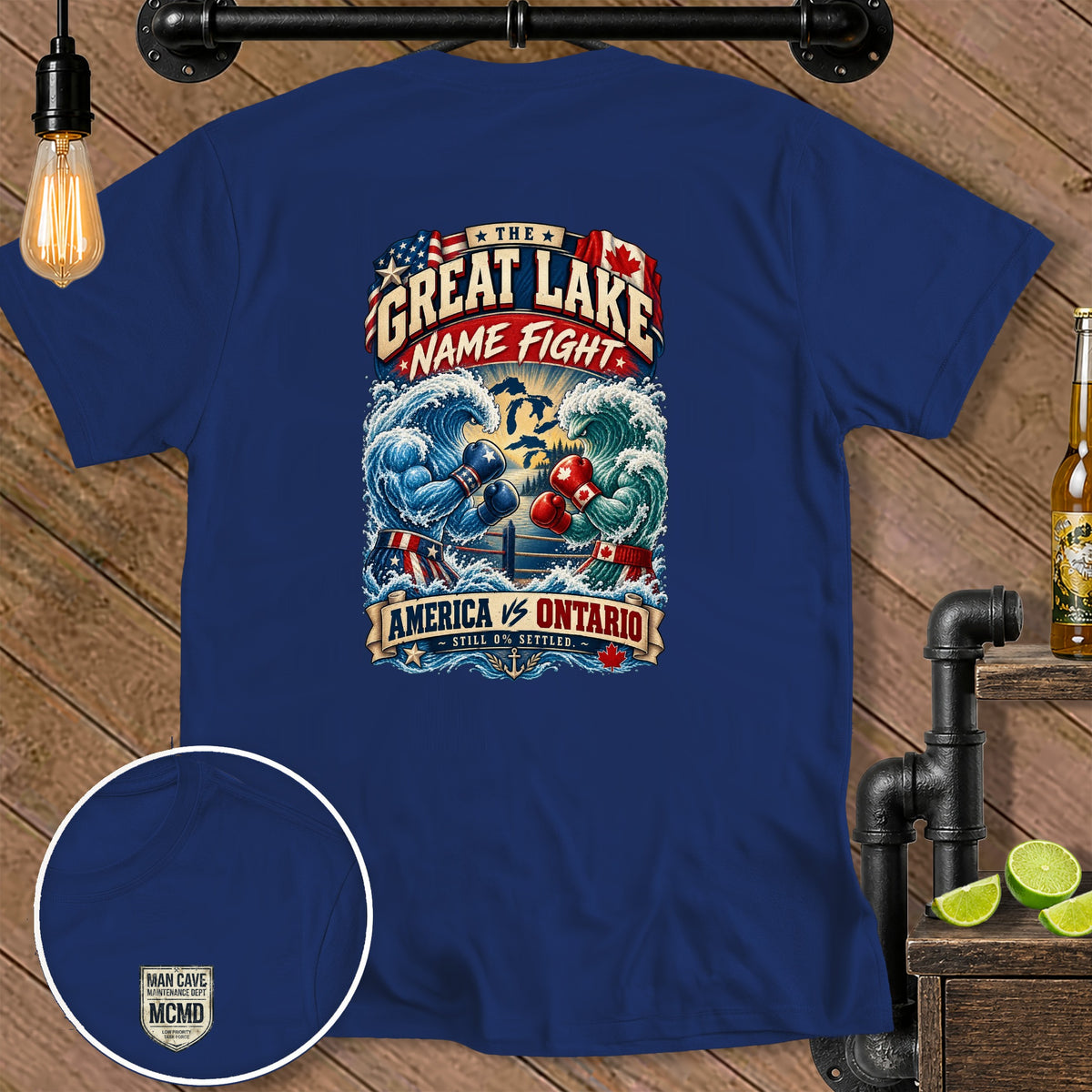 Blue t-shirt with "The Great Lake Name Fight America vs Ontario" graphic.