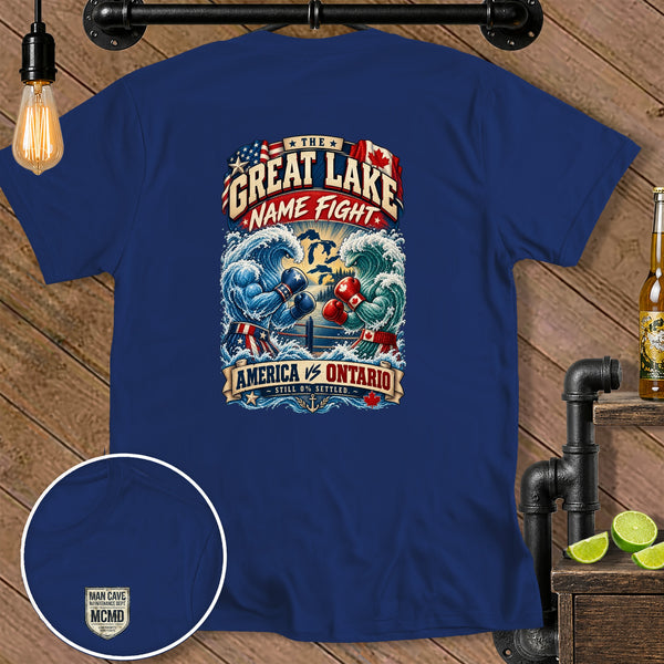 Blue t-shirt with "The Great Lake Name Fight America vs Ontario" graphic.