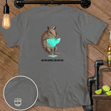 Armadillo holding a margarita with the text 