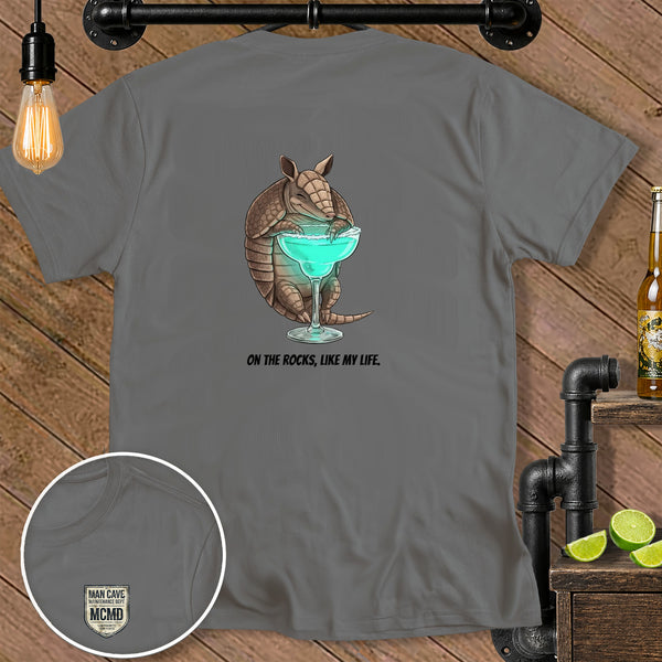 Armadillo holding a margarita with the text "On the rocks, like my life."