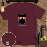 Maroon t-shirt with black cat wearing sunglasses and text 