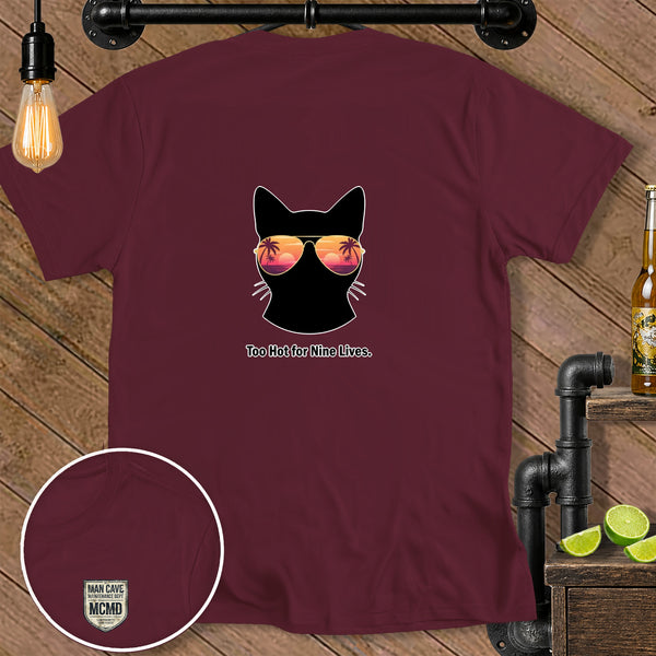 Maroon t-shirt with black cat wearing sunglasses and text "Too Hot for Nine Lives."