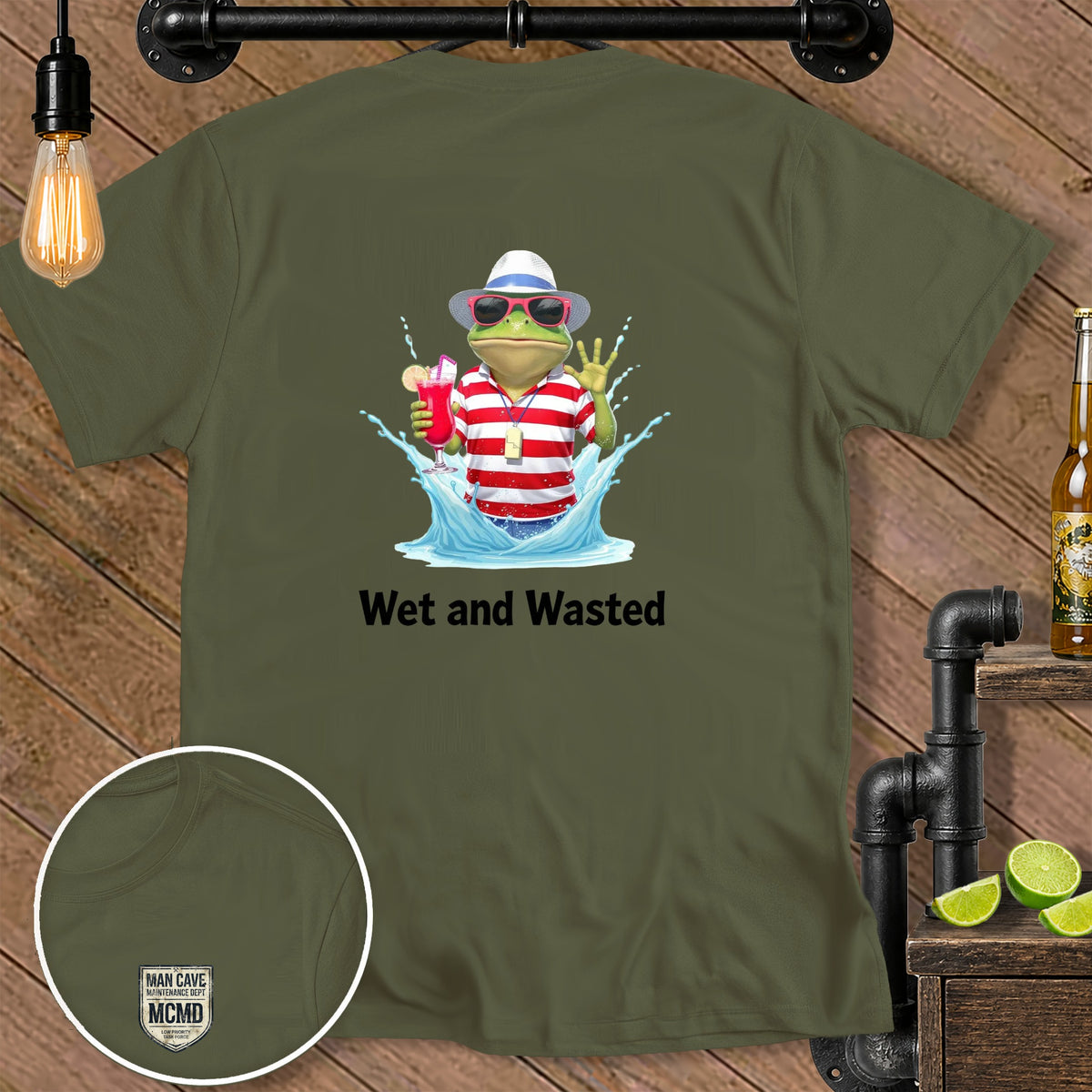 Green t-shirt with cartoon frog in sunglasses, hat, and striped shirt, holding a drink and splashing in water, text "Wet and Wasted".