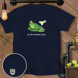 A crowned frog sits on lily pads with a margarita glass, text reads 