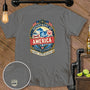 Grey t-shirt with "Department of America" graphic and "Man Cave Maintenance Dept MCMD" on chest pocket.
