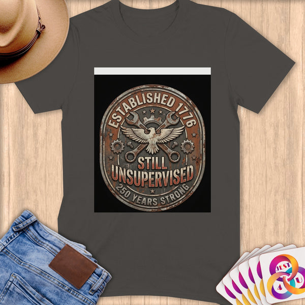 T-shirt graphic: "ESTABLISHED 1776 STILL UNSUPERVISED 250 YEARS STRONG" with eagle and tools.