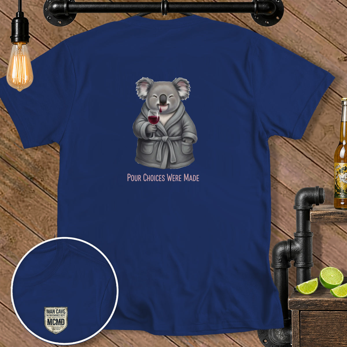 Blue t-shirt with a cartoon koala wearing a robe and holding wine, text "POUR CHOICES WERE MADE".