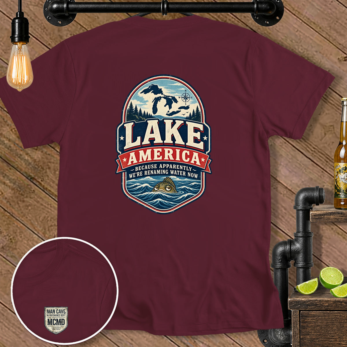 Maroon t-shirt with a "Lake America" graphic and a small "Man Cave Maintenance Dept." logo.