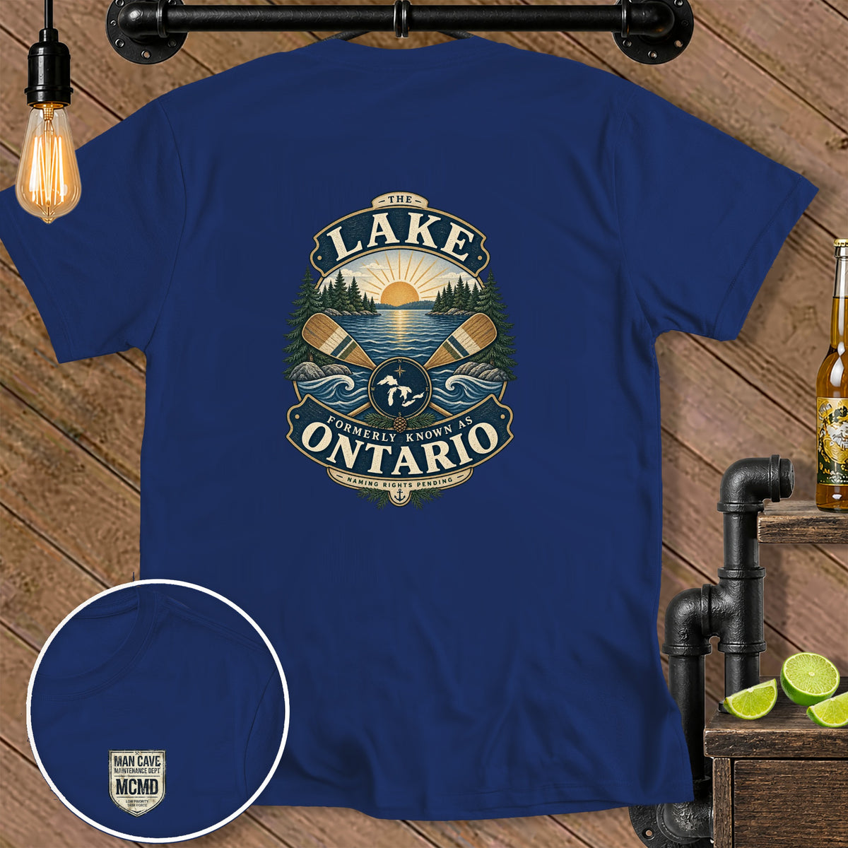 Navy t-shirt with "The Lake Formerly Known As Ontario" graphic and small "Man Cave Maintenance Dept" logo.