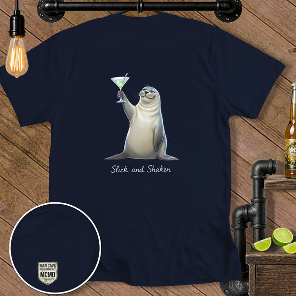 Seal holding martini glass with text "Slick and Shaken" on navy t-shirt.