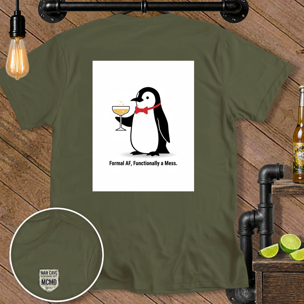 Olive green t-shirt with a penguin holding a drink and the text "Formal AF, Functionally a Mess."