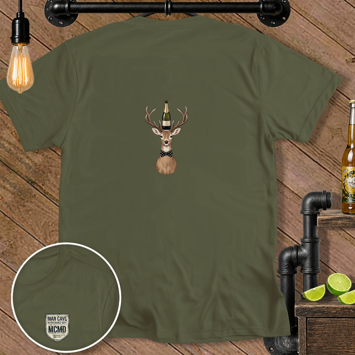 Olive green t-shirt with deer wearing bow tie and champagne bottle on head.