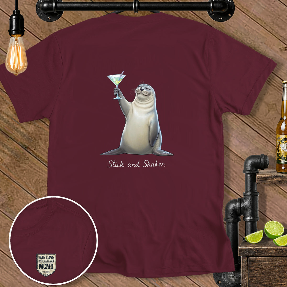 Maroon t-shirt with a seal holding a martini glass and text "Slick and Shaken".