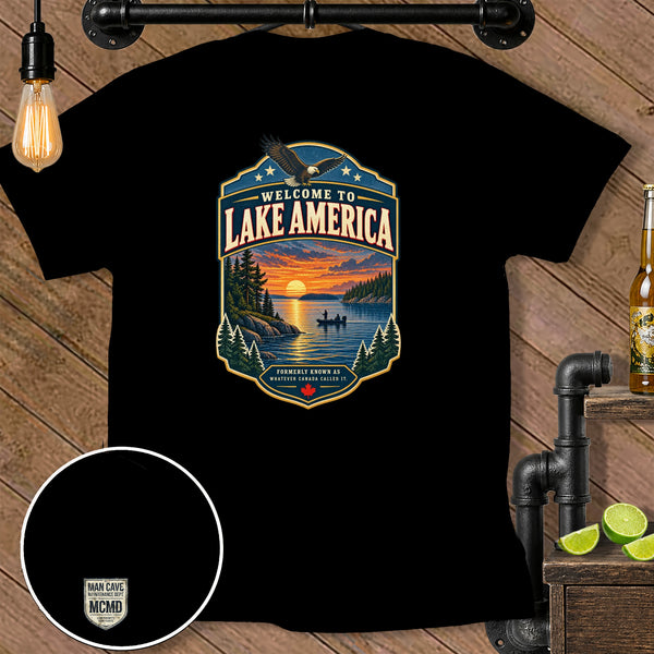Black t-shirt with "Welcome to Lake America" design featuring eagle and sunset lake scene.