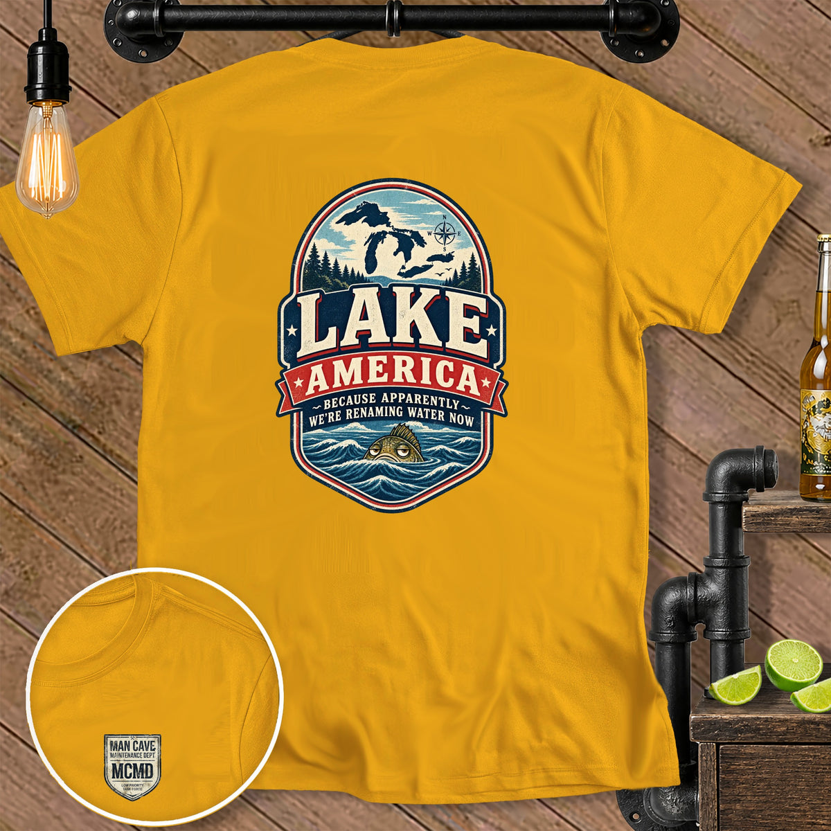 Yellow t-shirt with "Lake America" graphic and a fish in wavy water.