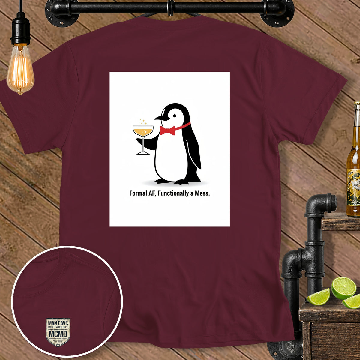 Maroon t-shirt with a penguin graphic holding a drink and the text "Formal AF, Functionally a Mess."