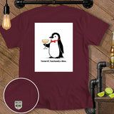 Maroon t-shirt with a penguin graphic holding a drink and the text 
