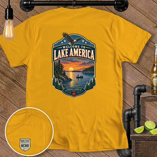 Yellow t-shirt with "Welcome to Lake America" graphic featuring an eagle and lake sunset.