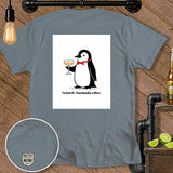 Graphic tee with a penguin holding a drink and text 