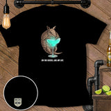 Armadillo holding a blue cocktail with text 