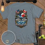 Shirt graphic featuring Lake America Ontario, US and Canadian flags, and nautical elements.