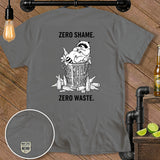 Gray t-shirt with raccoon in trash can graphic and text 
