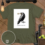 Olive green t-shirt with raven holding a key, 