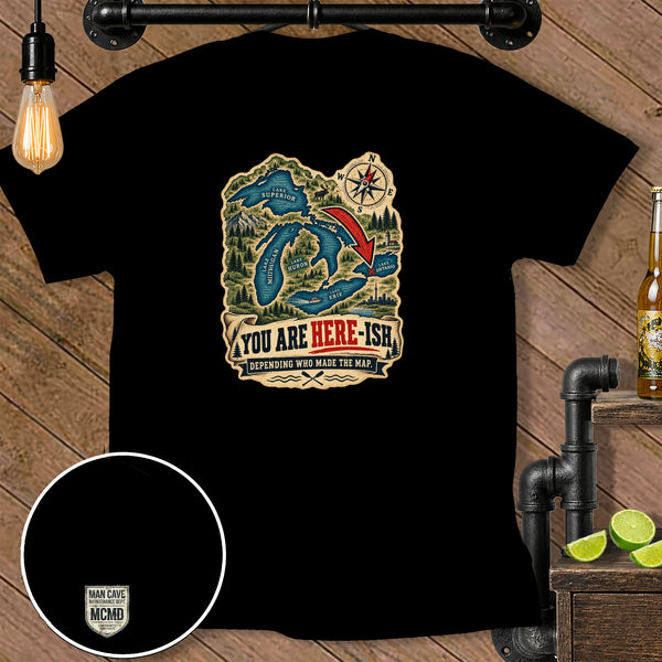 Black t-shirt with Great Lakes map graphic and text "YOU ARE HERE-ISH".