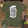 Raccoon in trash can holding a bottle, with "MAN CAVE MCMD" logo on shirt.